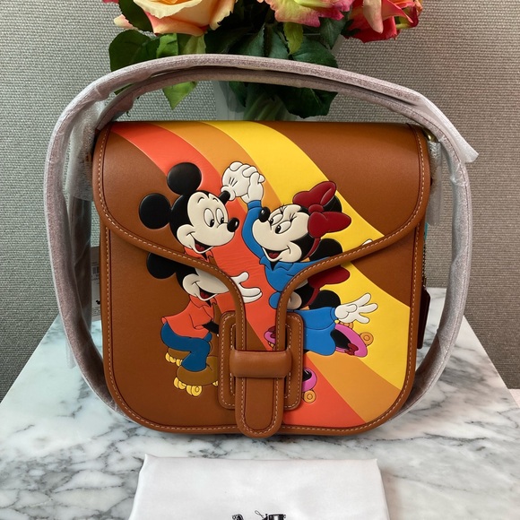 Coach Handbags - NWT FACTORY SEALED Coach Burnished Amber Disney Mickey Courier Bag - Retail $550